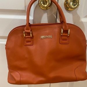 Woman’s Kenneth Cole Terra-cotta color hobo bag